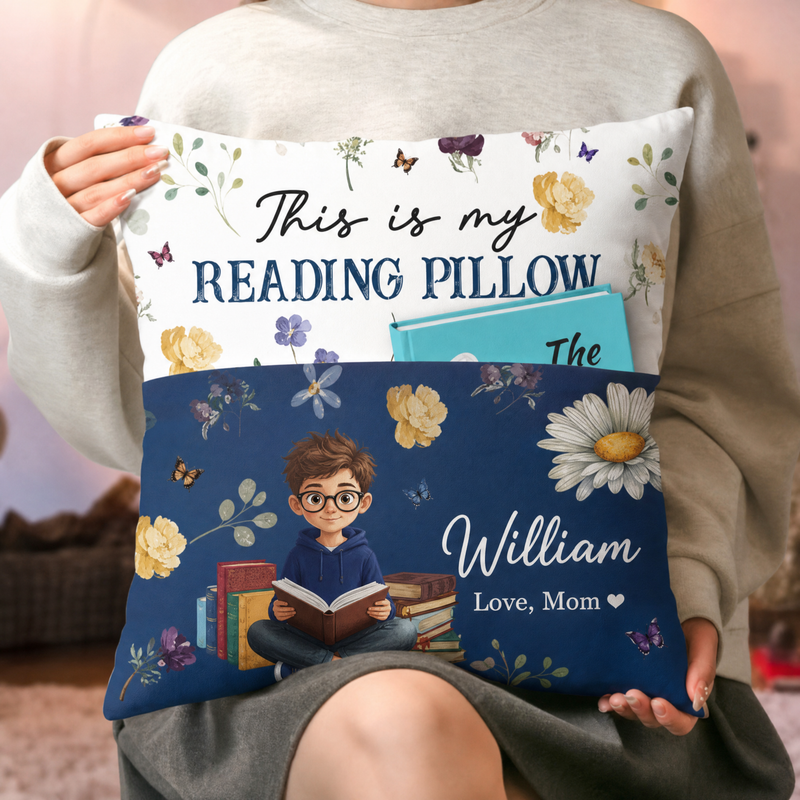 Personalized reading pillow with book pocket, reader character, name, and birth flower